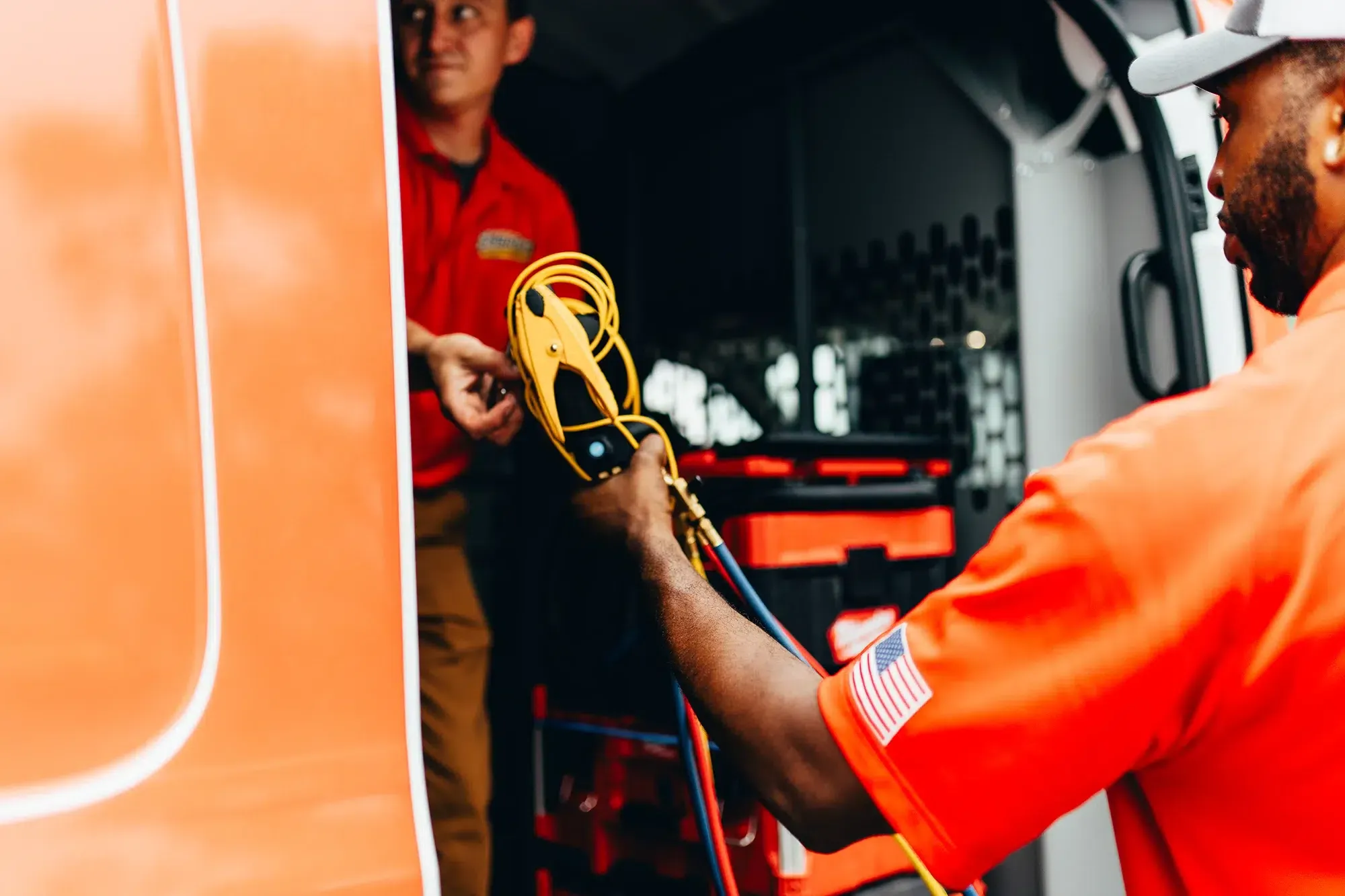 Close-up of Embrich Plumbing, Heating & Air Conditioning service expert using specialized plumbing tools and equipment in Collinsville