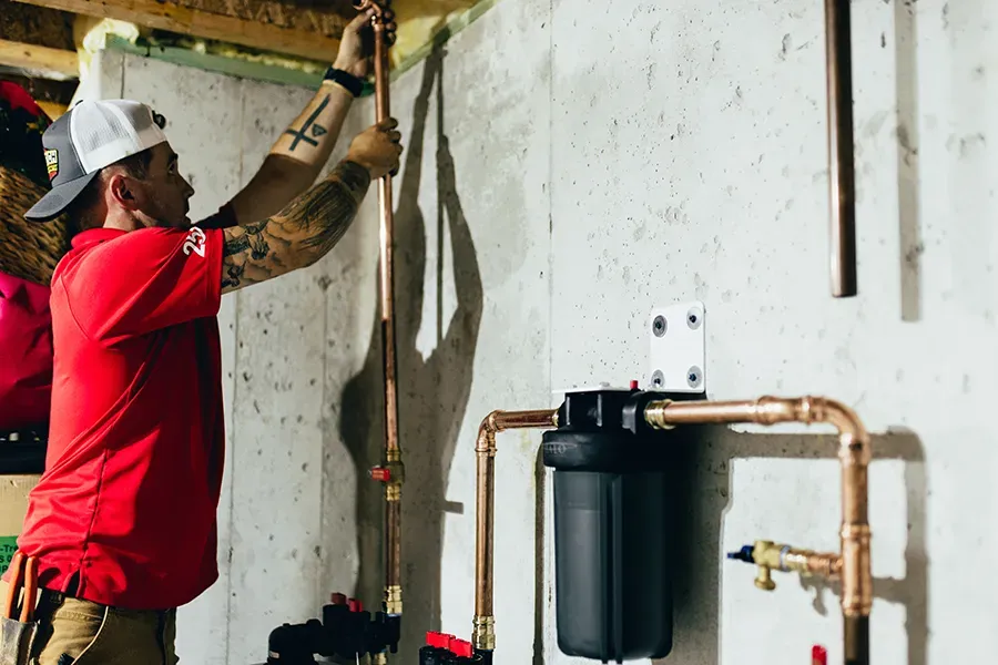 Embrich service expert working on pipes
