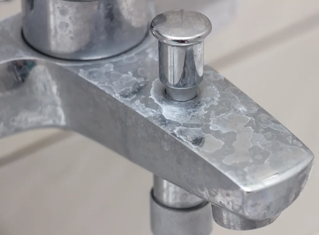 hard water scaling on the faucet