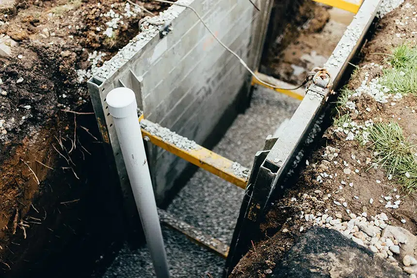 Newly installed plumbing pipe in trench during underground plumbing repair in Collinsville